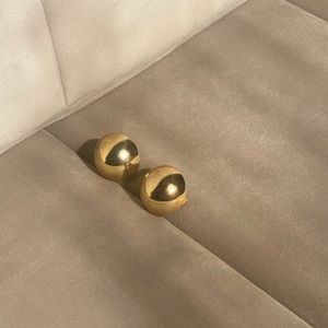 Gold toned clip on earrings